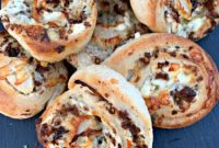 Savory Steak & Kraut Pinwheels with Sweet Caramelized Onions and Sharp White Cheddar