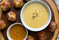 Golden Pretzel Sausage Bites with Zesty Cheese Sauce