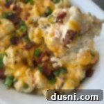 Loaded Cauliflower Casserole close up on a spoon