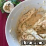 Golden Roasted Garlic Butter 11 overhead of Roasted Garlic Butter in a white bowl