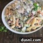 Velvety Italian Mixed Bean Pasta Salad 9 Close up of Creamy Italian Four Bean Pasta Salad in a white bowl, ready to serve