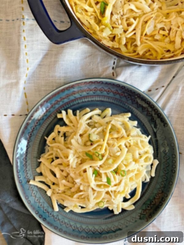 Polish Noodles & Kraut - kluski kapusta kiszona on a blue plate