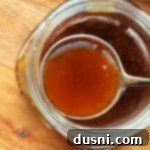 Bourbon Honey Sauce 16 A full serving spoon of delicious honey bourbon sauce