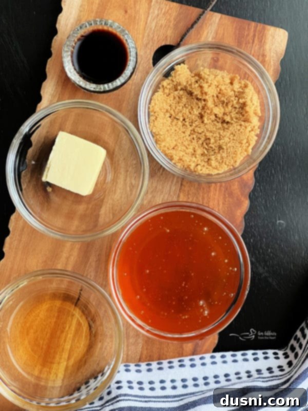 Bourbon Honey Sauce 6 Bowl of Honey Bourbon Sauce with a spoon in it