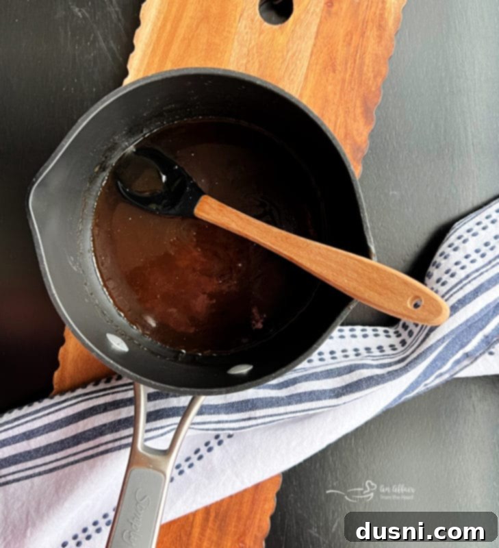 Bourbon Honey Sauce 8 Adding bourbon to the melted butter and brown sugar mixture