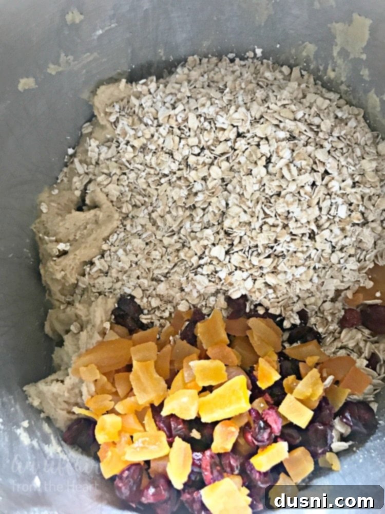Cranberry Apricot Oatmeal Cookie dough in a bowl, ready for baking.