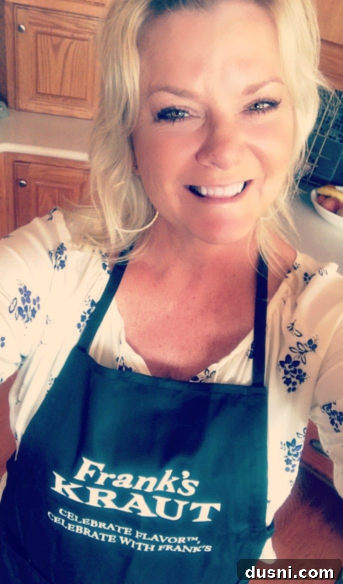 Michaela wearing a Frank's Kraut apron