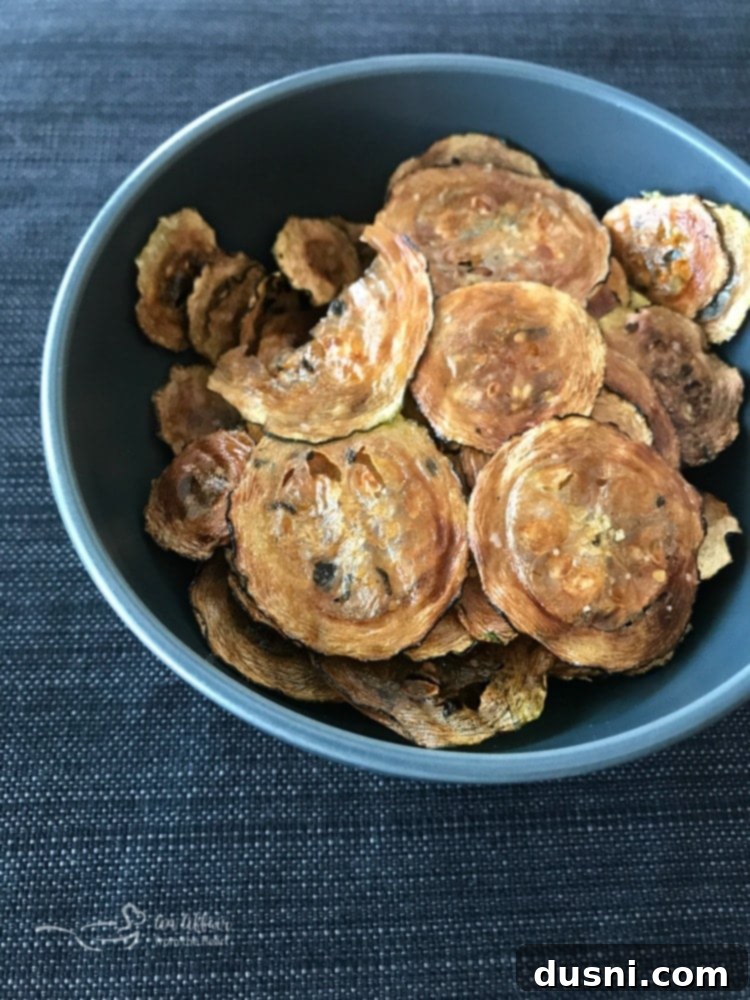 Italian Style Baked Zucchini Chips arranged on a plate