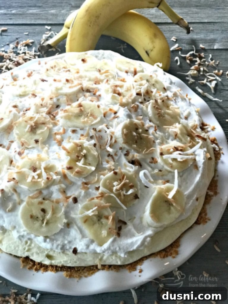 A generous slice of Banana Cream Pie on a plate