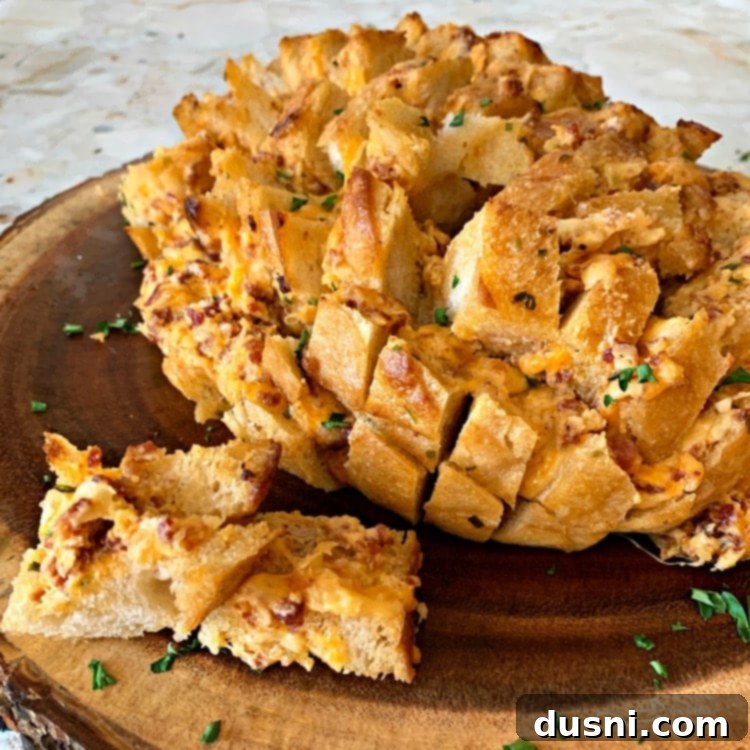 Close up of Dorothy's Cheesy Bacon Pull-Apart Bread, a popular appetizer