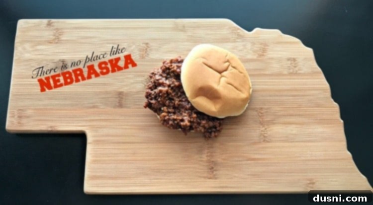 Generous serving of Sloppy Dorothy meat on a bun, ready to eat