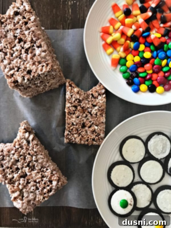 Assorted candies and separated Oreo cookies for decorating