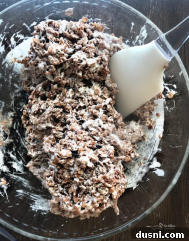 Cocoa Krispies cereal mixed with melted marshmallow