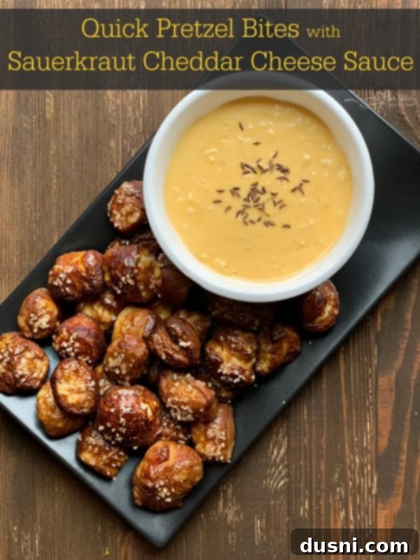 Cheesy Sauerkraut Pretzel Poppers 17 Quick Pretzel Bites with Sauerkraut Cheddar Cheese Sauce, served as an Oktoberfest appetizer