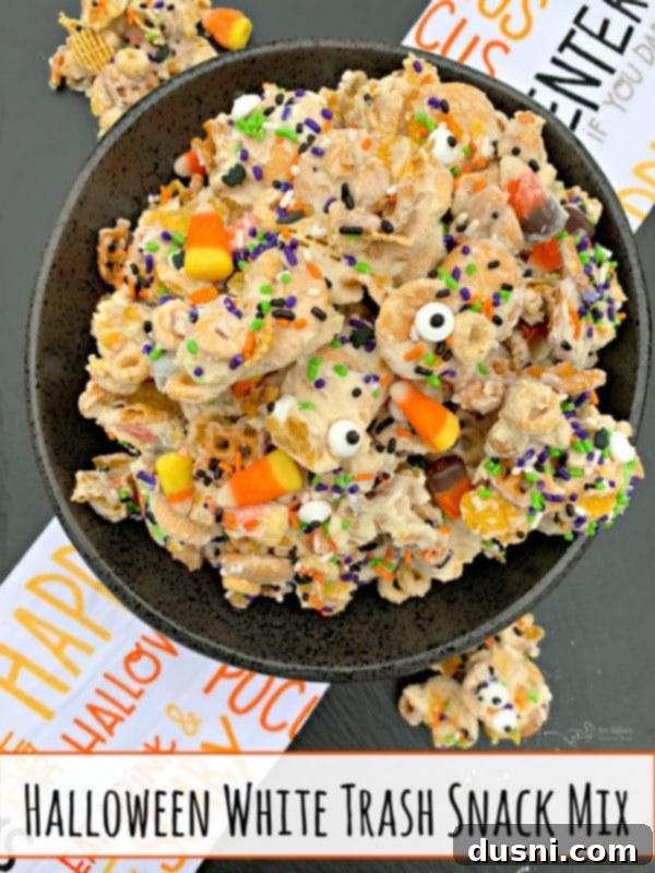 Monster Mash Snack Mix 8 Finished Halloween White Trash Snack Mix in a bowl