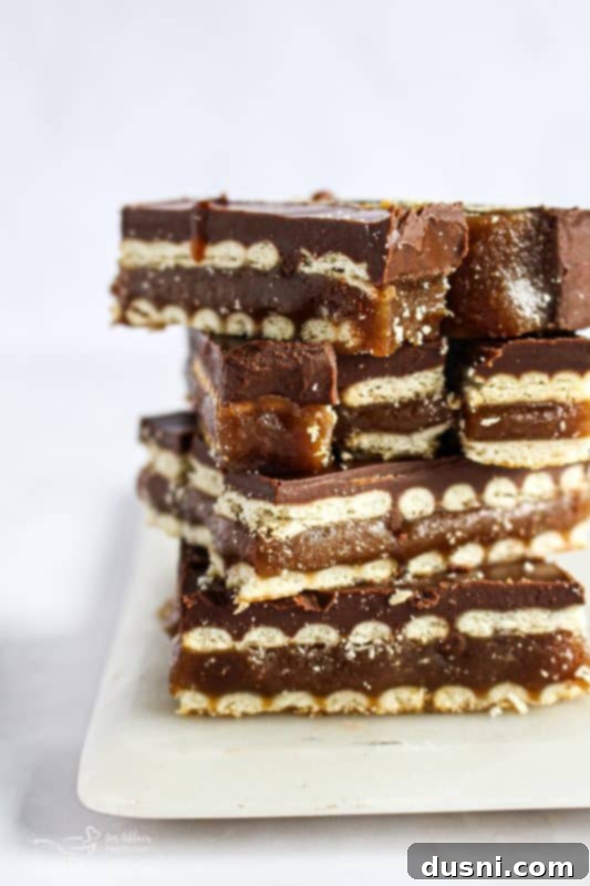 Homemade Caramel Shortbread Chocolate Bars 15 Homemade Twix Bars on a cooling rack