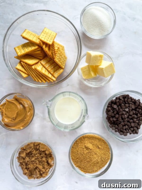 Homemade Caramel Shortbread Chocolate Bars 3 Homemade Twix Bars with a bite taken out, showing layers