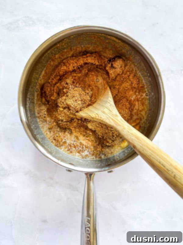 Homemade Caramel Shortbread Chocolate Bars 6 Layer of Club Crackers in baking dish