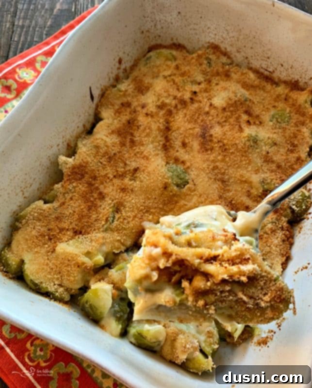 Cheesy Brussels Bake 10 Serving a portion of Brussels Sprouts Gratin
