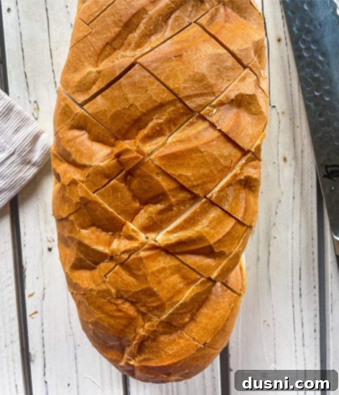 Slicing French bread for Crack Bread