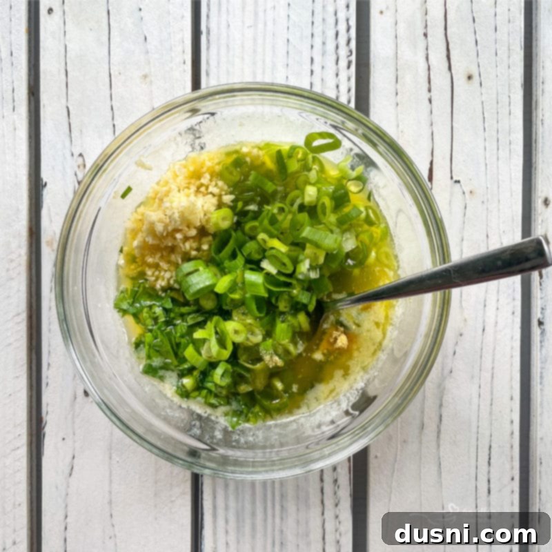 Mixing garlic butter for Crack Bread