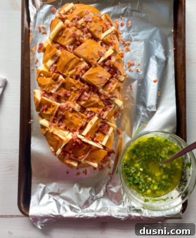Stuffing Cheesy Crack Bread with cheese slices