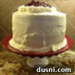 Lush Cherry Torte 2 Cherry torte cake on a white cake plate