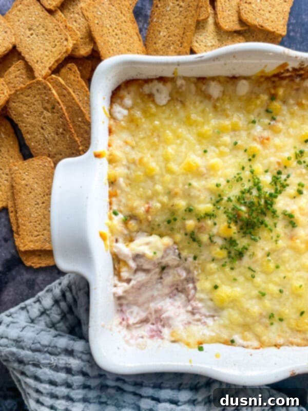 Crock Pot Reuben Dip with a serving spoon
