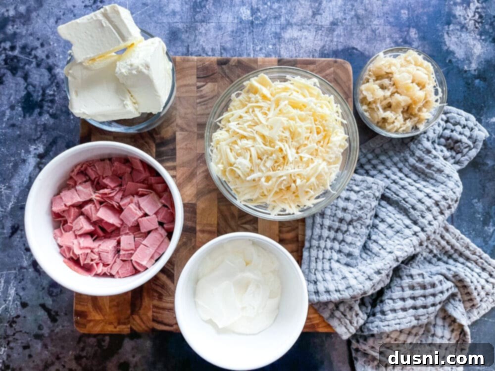 Crock Pot Reuben Dip with a spoon, ready to serve