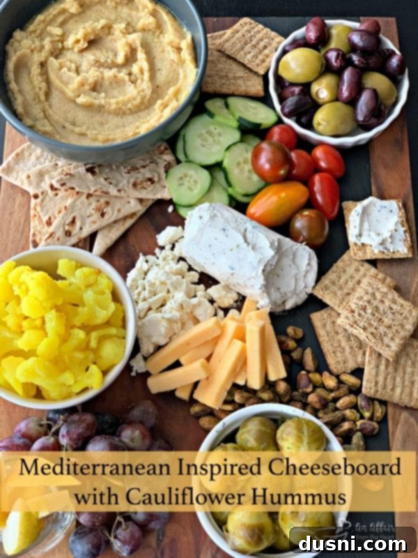 Sun-Kissed Mezze Platter with Creamy Cauliflower Hummus 20 Mediterranean Inspired Cheeseboard with Cauliflower Hummus and step-by-step instructions
