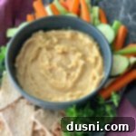Sun-Kissed Mezze Platter with Creamy Cauliflower Hummus 22 Cauliflower Hummus in a blue bowl ready to serve