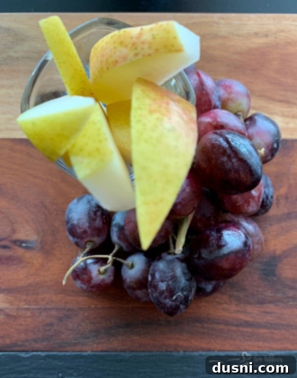 Sun-Kissed Mezze Platter with Creamy Cauliflower Hummus 4 Using small containers and shot glasses on a Mediterranean cheeseboard
