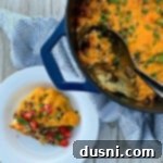 Hearty Dutch Oven Brunch Casserole 17 overhead of Dutch Oven Brunch Bake - Sausage Egg Casserole