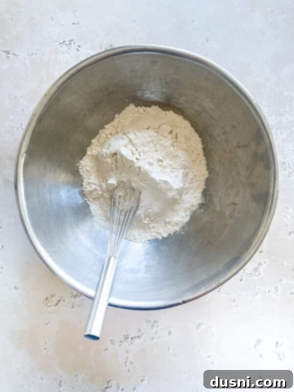 Luscious White Chocolate Cherry Cookies 9 Mixing dry ingredients in a small bowl