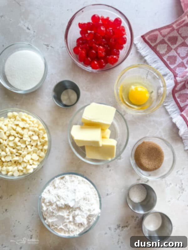 Luscious White Chocolate Cherry Cookies 6 White Chocolate Cherry Cookies on a cooling rack