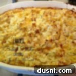 overhead of loaded baked potato casserole with text of the same