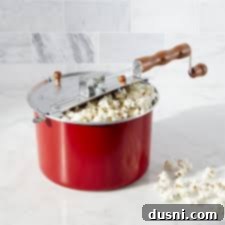 Classic stovetop popcorn popper for traditional homemade popcorn.