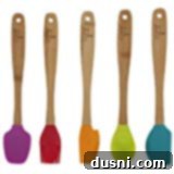Set of colorful mini spatulas for precise kitchen tasks.