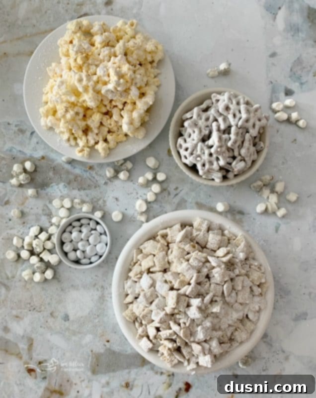 Enchanted Winter Mix 7 Ingredients for Winter Wonderland Snack Mix laid out for preparation