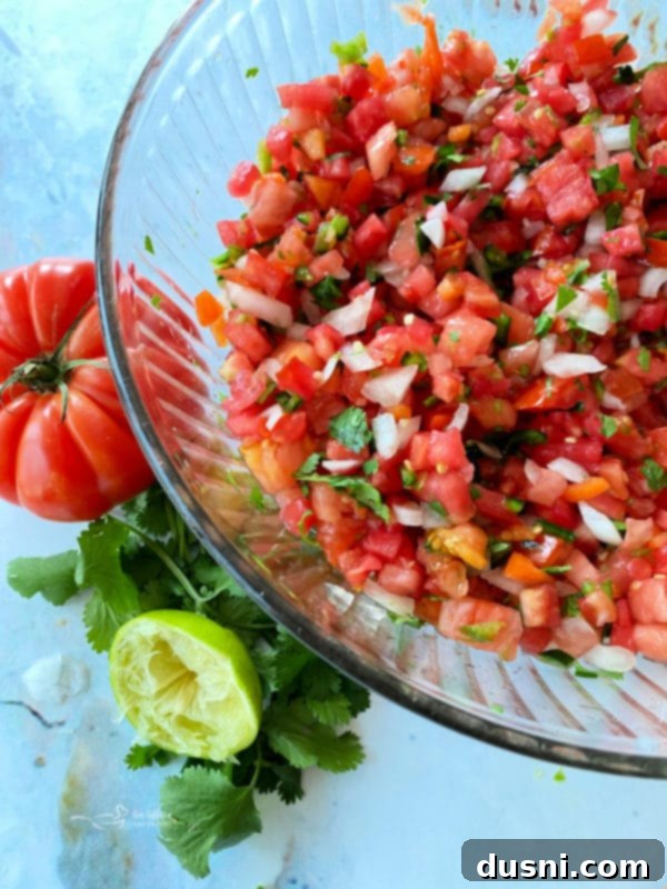 Fresh Tomato Salsa 2 Close-up of fresh Pico de Gallo in a glass bowl