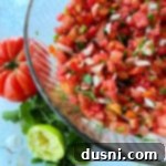 Fresh Tomato Salsa 14 Overhead of Pico de Gallo in a clear bowl