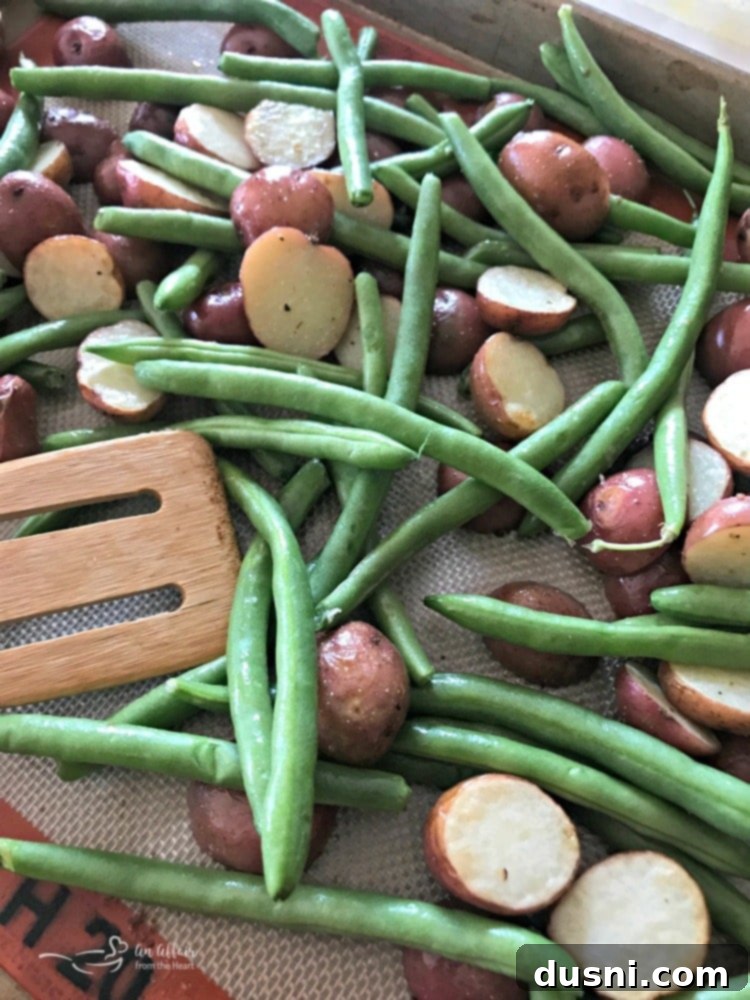 Golden Roasted Salmon with Crispy Potatoes and Tender Green Beans 7 Roasted Salmon Sheet Pan Meal with Potatoes & Green Beans