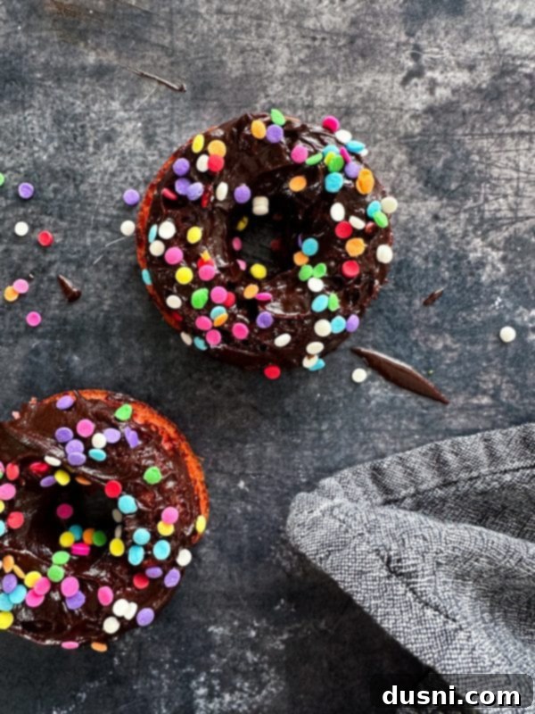 Decadent Baked Chocolate Covered Strawberry Donuts 15 A display of chocolate covered strawberry donuts