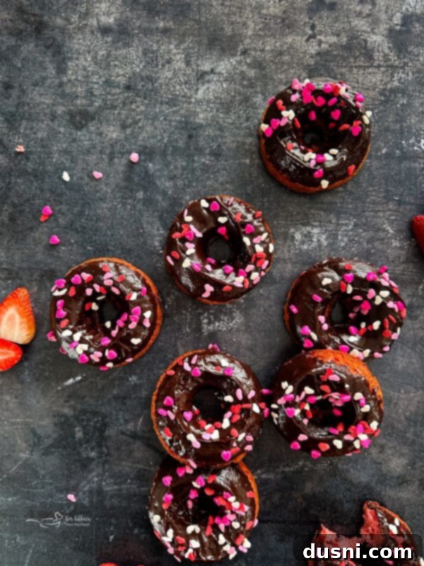 Decadent Baked Chocolate Covered Strawberry Donuts 7 Ingredients being mixed for chocolate covered strawberry donuts