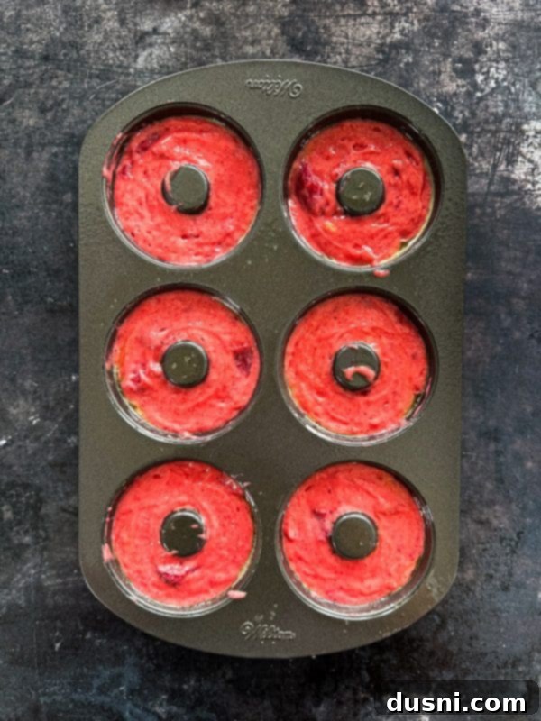 Decadent Baked Chocolate Covered Strawberry Donuts 9 Donut batter with strawberries mixed in