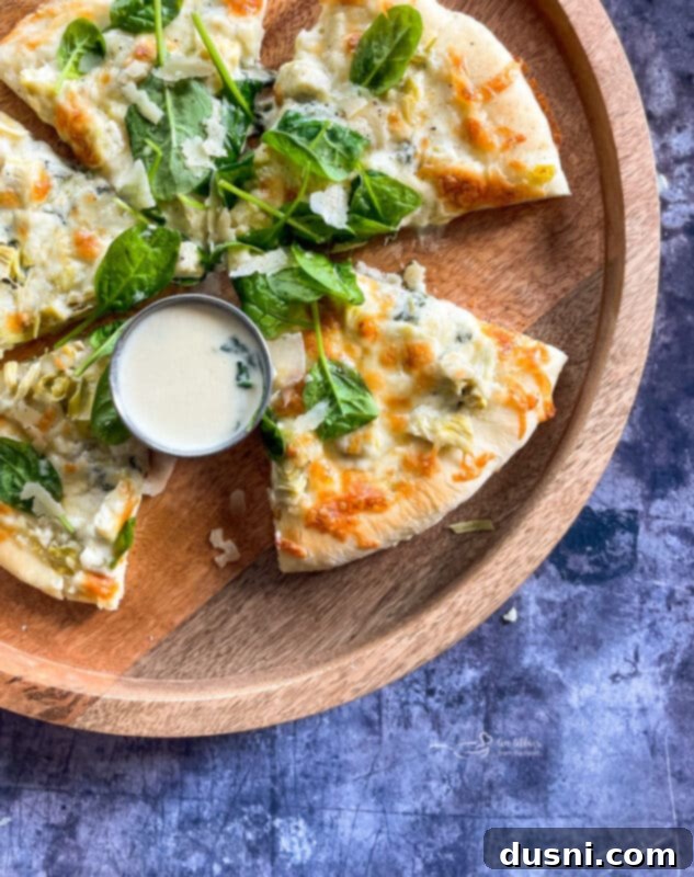 Spinach Artichoke Alfredo Pizza close-up