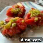 close up Stuffed Pepper Meatloaf Minis on a white plate
