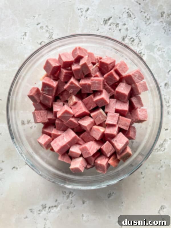 Corned Beef and Cabbage Comfort Soup 8 Cooking onions and carrots for soup