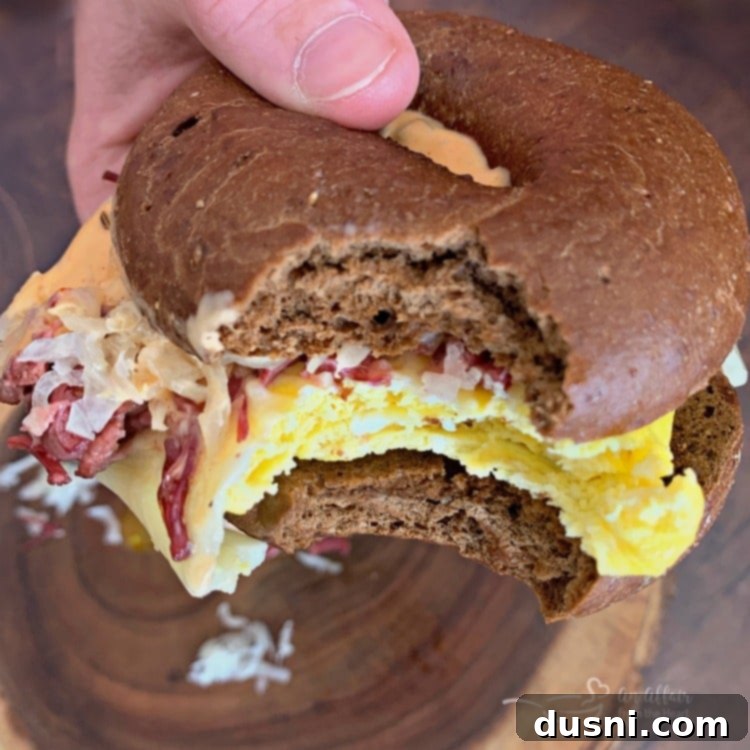 Reuben Breakfast Sandwiches Two Ways, close-up of a bite taken