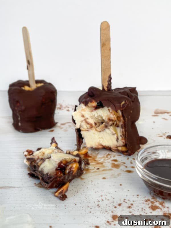 Side angle of two delicious Homemade Buster Bars, ready to enjoy